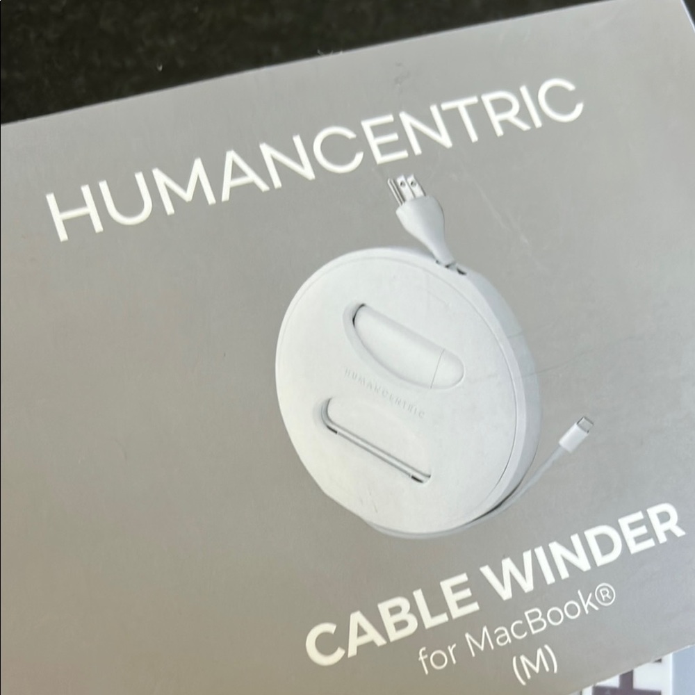 Humancentric Cable Winder for MacBook